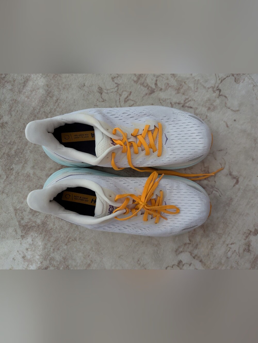 Hoka One One Women's White Running Shoes with Yellow Laces